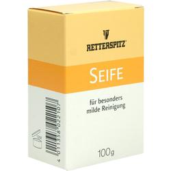 Gelbe und weiße Seifenschachtel mit Aufschrift "für besonders milde Reinigung".